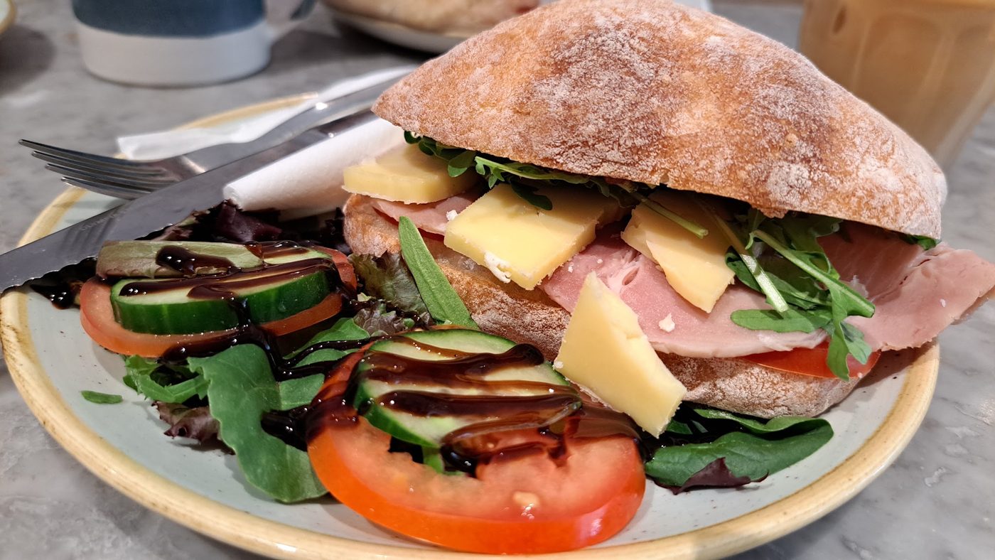 A ciabatta sandwich with salad