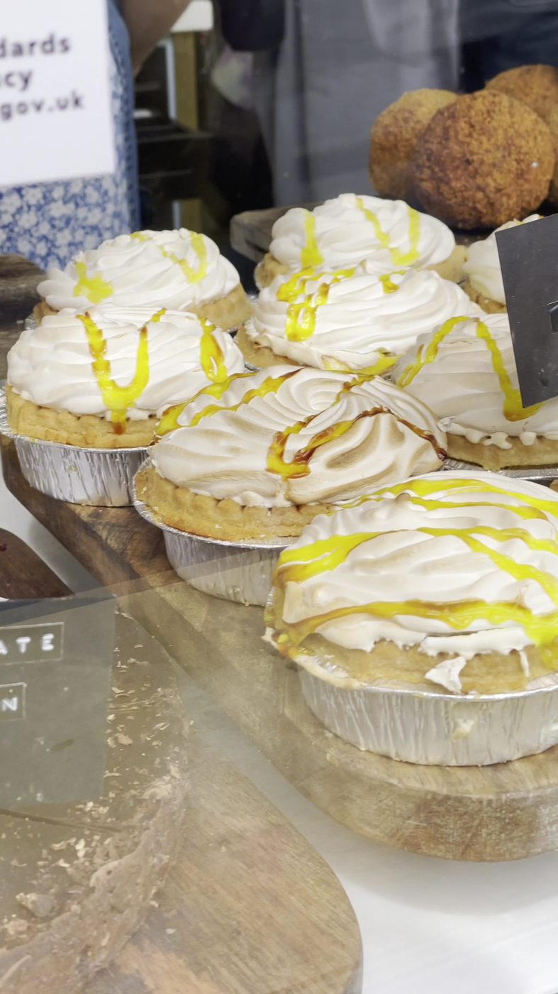 Meringue-topped tarts in the display